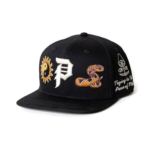 Primitive badlands snapback black
